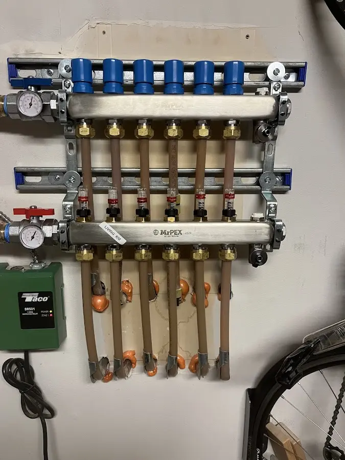 Plumber performing Gas Leak Detection at a residential property in Ferguson